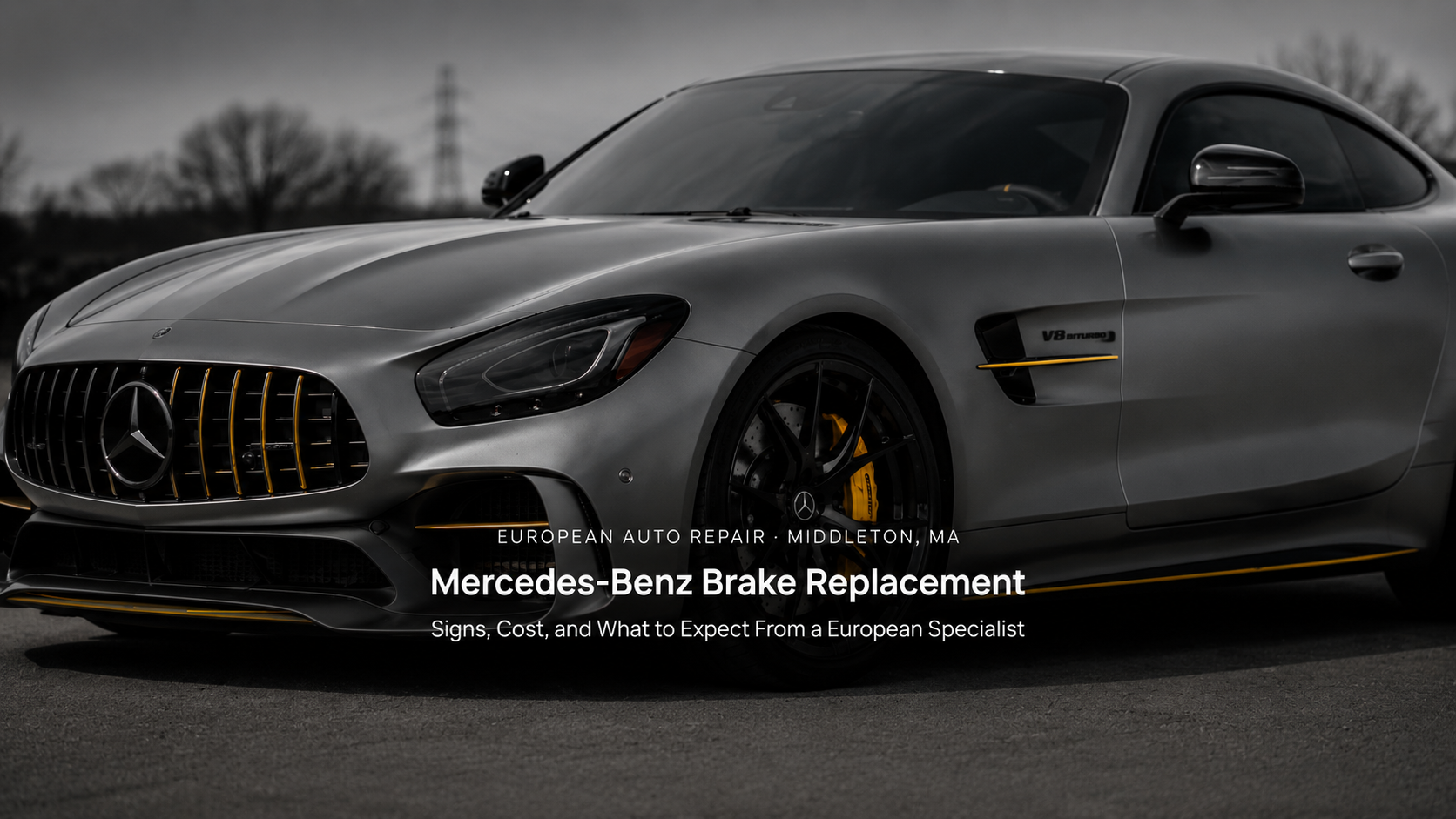 A silver Mercedes-Benz sports car parked outdoors, with text overlay about brake replacement services from a European auto repair specialist in Middleton, MA.